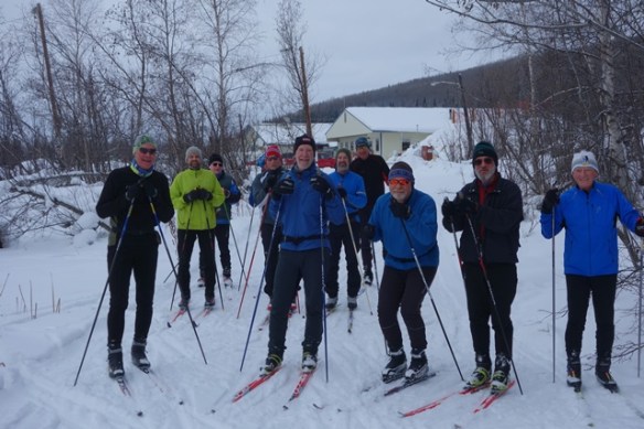 Sonot skiers and volunteers on pond sm