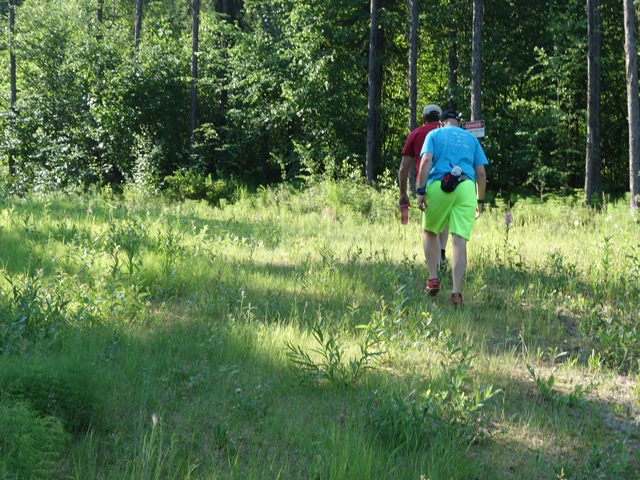 Trail groomer leading us out of the White Bear bog.JPG